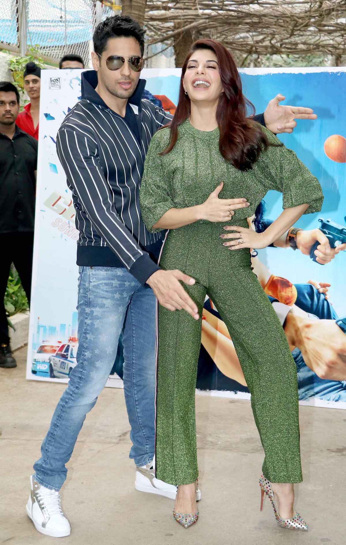 Sidharth Malhotra and Jacqueline Fernandez pull out their ‘A Gentleman’ guns for the shutterbugs.