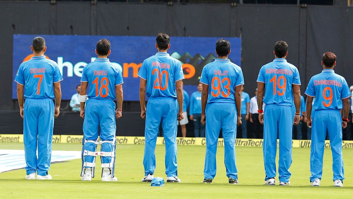 

The Indian cricket players stand for the national anthem ahead of a match.