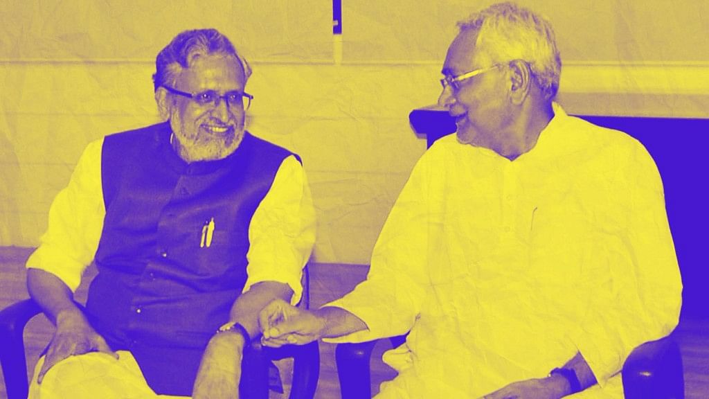 Bihar Chief Minister Nitish Kumar with senior leader of BJP Sushil Kumar Modi at legislators meeting in Patna on Wednesday.&nbsp;