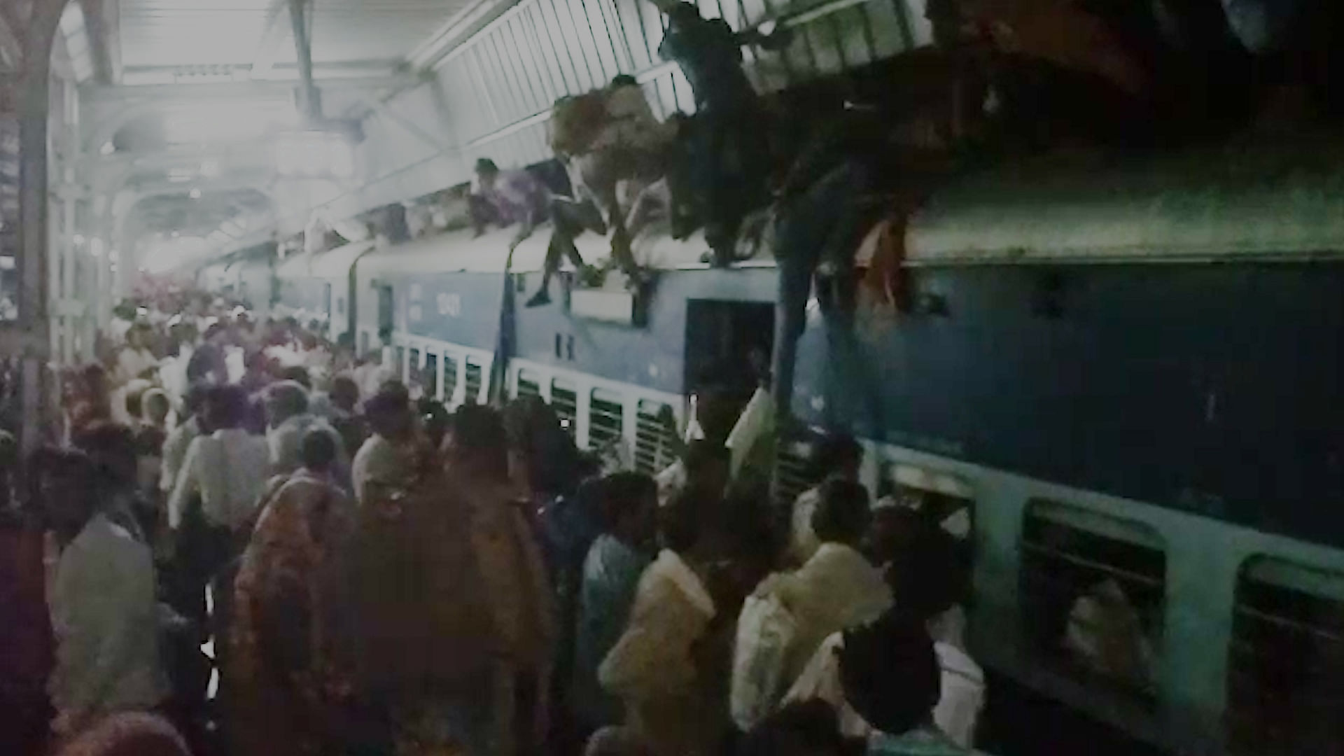 Passengers board the train to Chitrakoot Mela