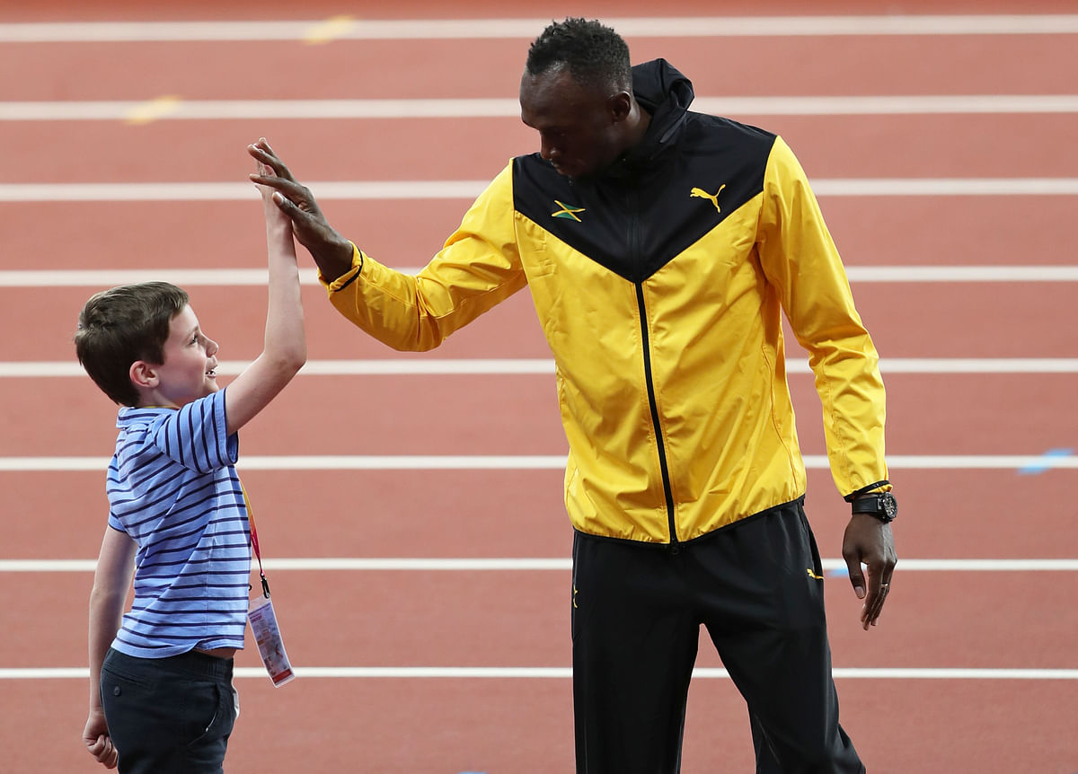 Usain Bolt took an emotional final bow on the track at the end of the World Championships in London on Sunday.
