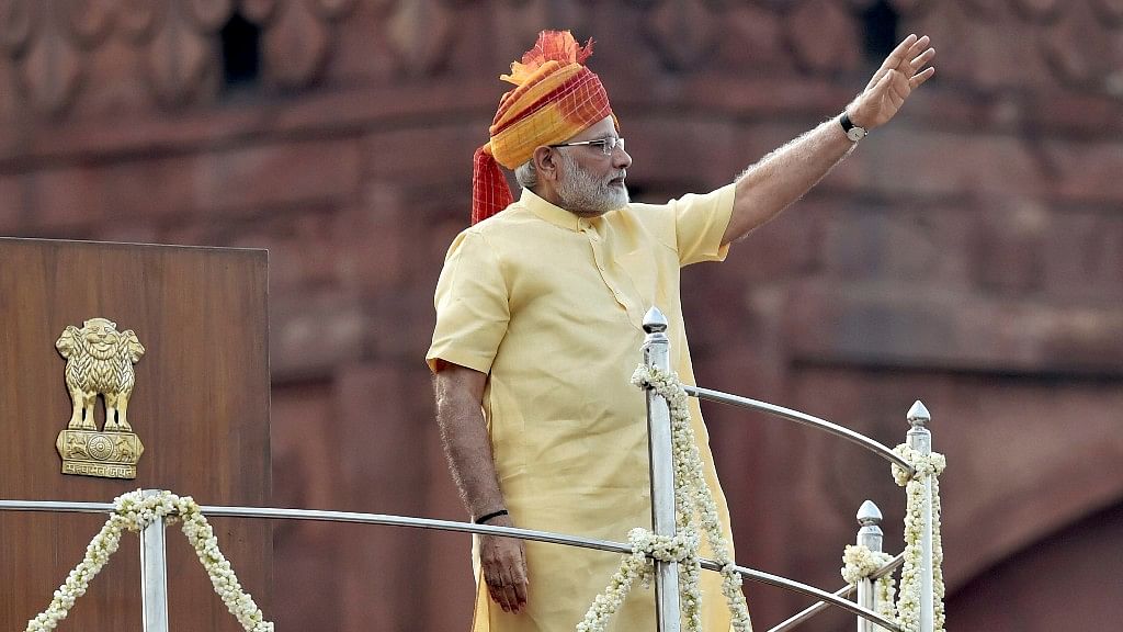 Prime Minister Narendra Modi waves to the crowd during Independence Day celebrations at the Red Fort in New Delhi on Tuesday.