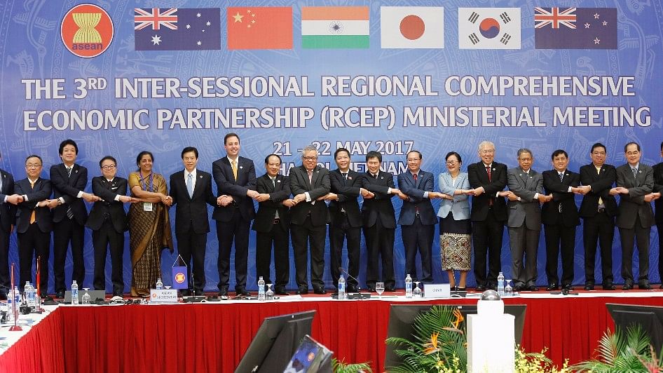 Trade ministers pose for a photo during the third inter-sessional RCEP ministerial meeting in Hanoi, Vietnam.