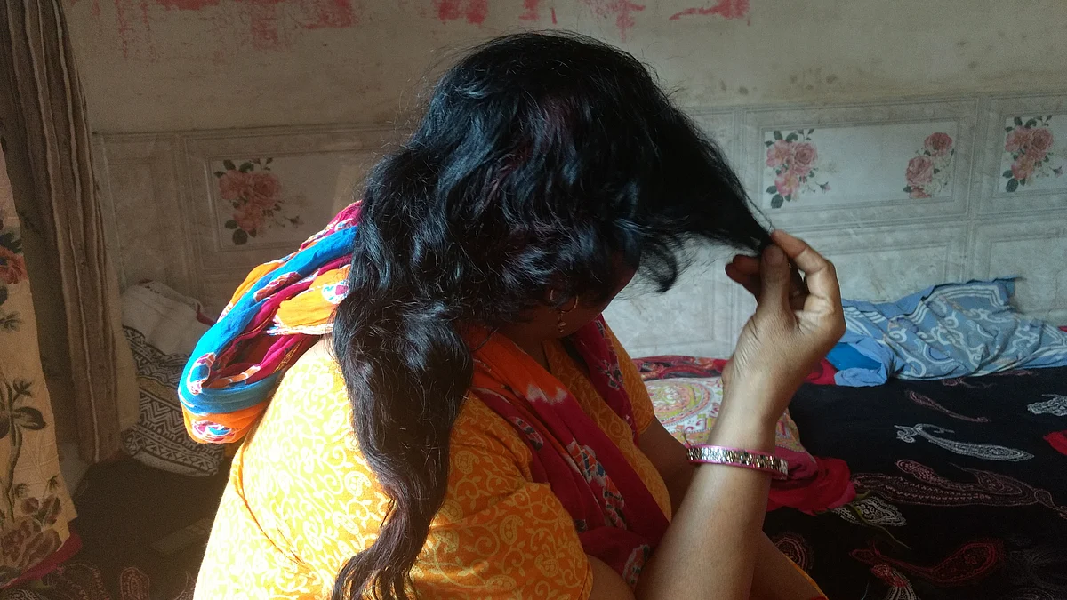 Kamla shows her hair that was cut mysteriously on Wednesday night.