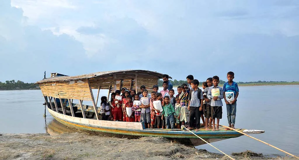 The floating school on a boat has helped children living on river islands not miss classes during the floods. 