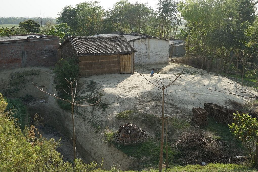 Shatrughan Rai has raised the level of his land by nearly 15 metres and once again constructed a modest hut. 