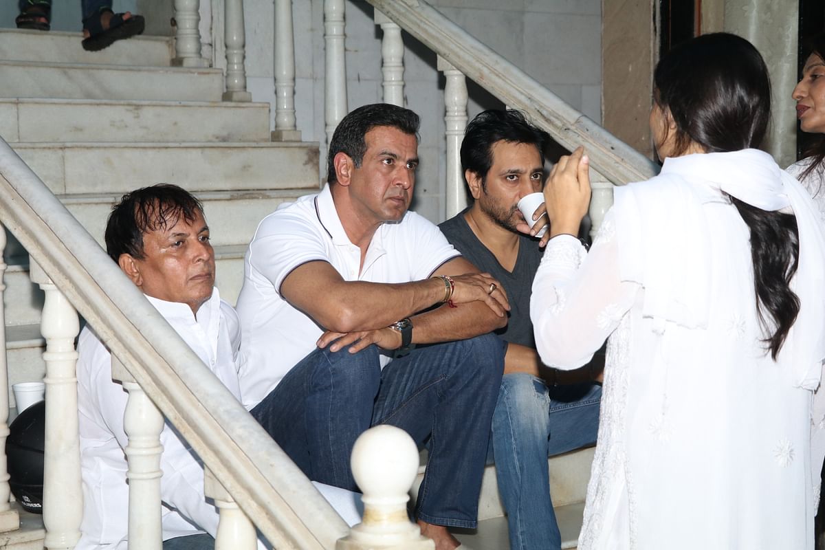 Family and friends come to pay their respects at a prayer meet for the late actor Inder Kumar.