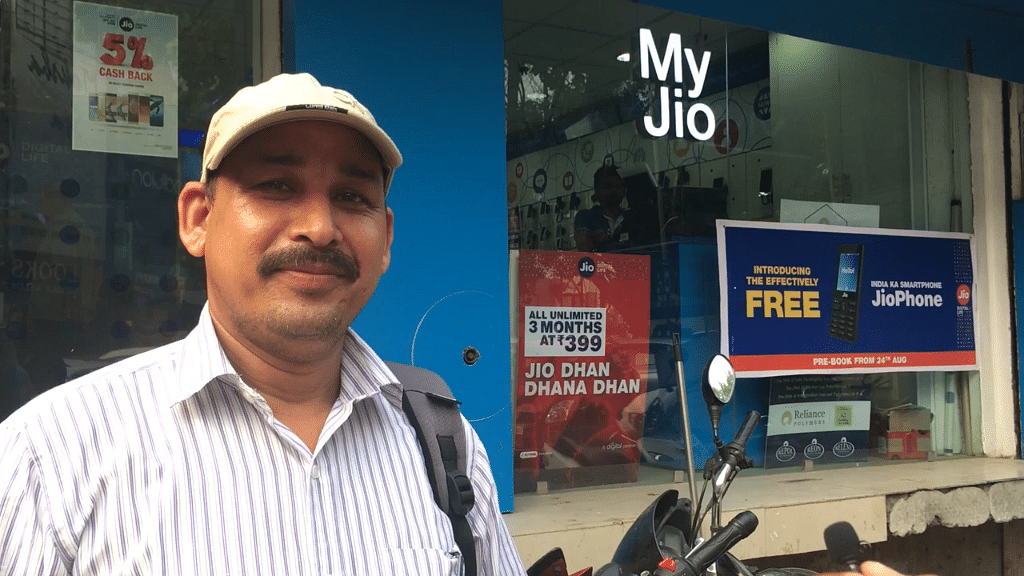 JioPhone customer at a Reliance Jio retail store in Noida