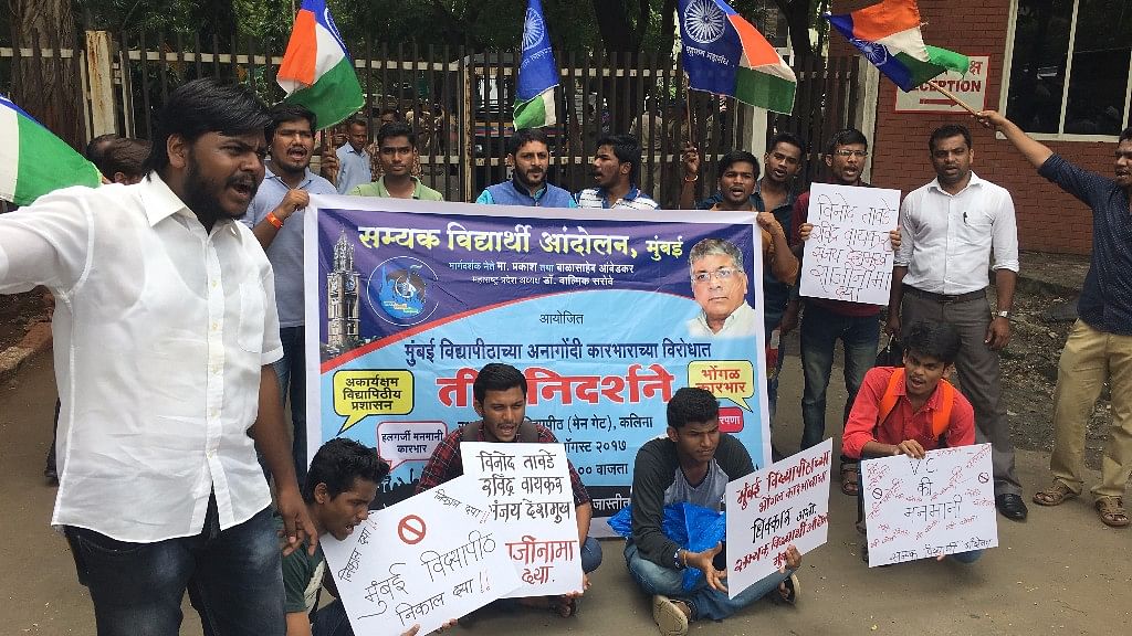 Students protest outside the Mumbai University campus in Kalina.