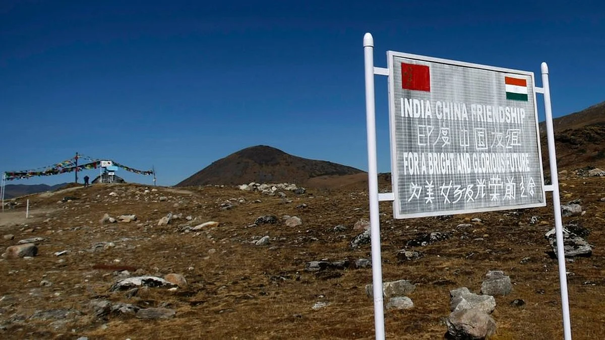 A signboard is seen from the Indian side of the Indo-China border at Bumla, Arunachal Pradesh.