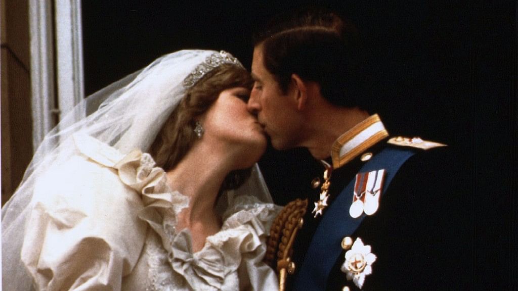 Prince Charles kisses his new bride Diana on their wedding day 29 July  1981