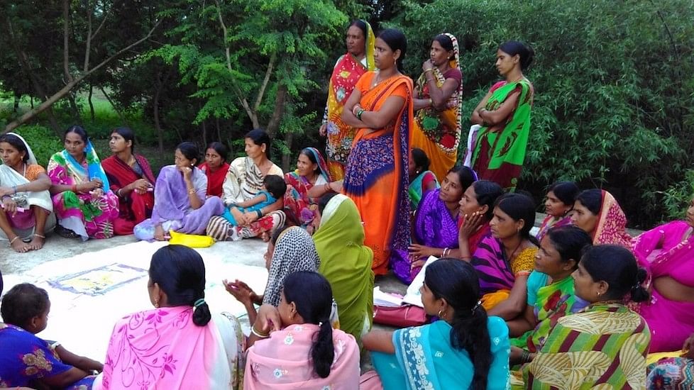 A woman’s meeting in Jehanabad to discuss the benefits of building toilets in homes.&nbsp;
