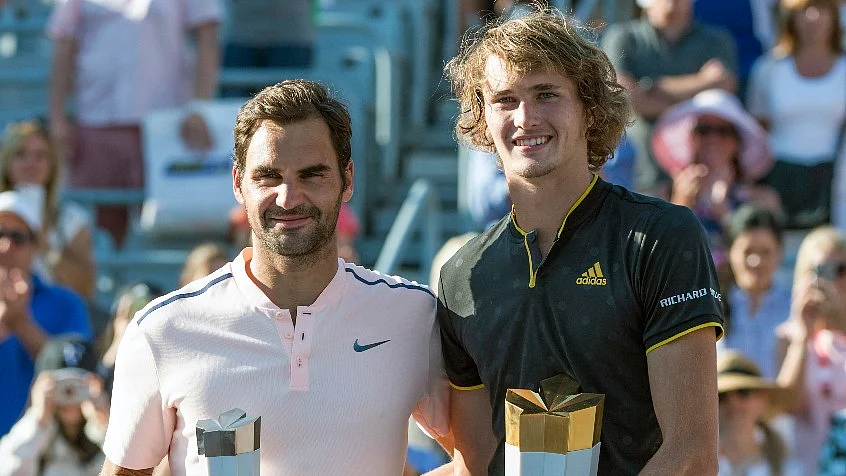 Roger Federer and Alexander Zverev pose for a photo after the Rogers Cup final in 2017.