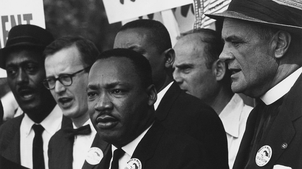 

An archival image of Martin Luther King Jr (centre). 