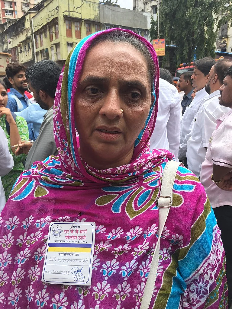 Fareeda Iqbal Mansoori volunteers to help at the collapse site.