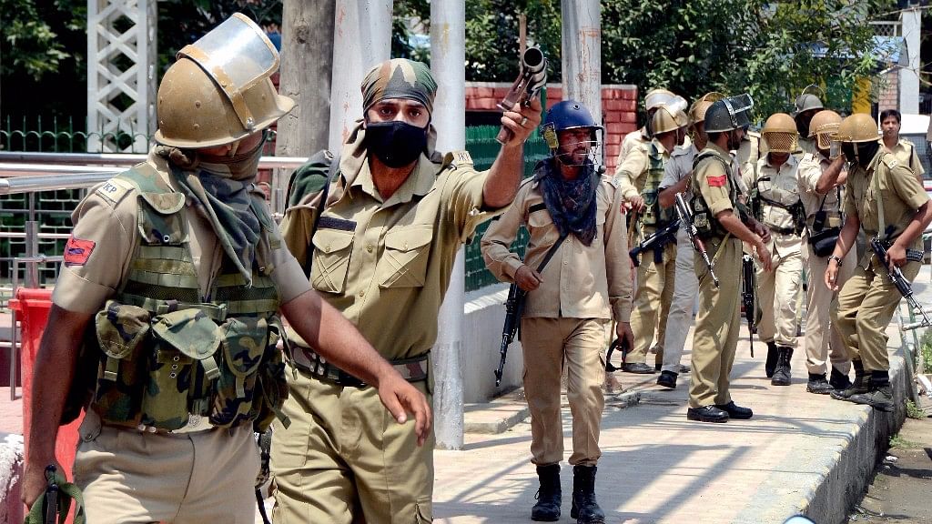 Security personnel in Kashmir after clashes following Abu Dujana’s death.&nbsp;