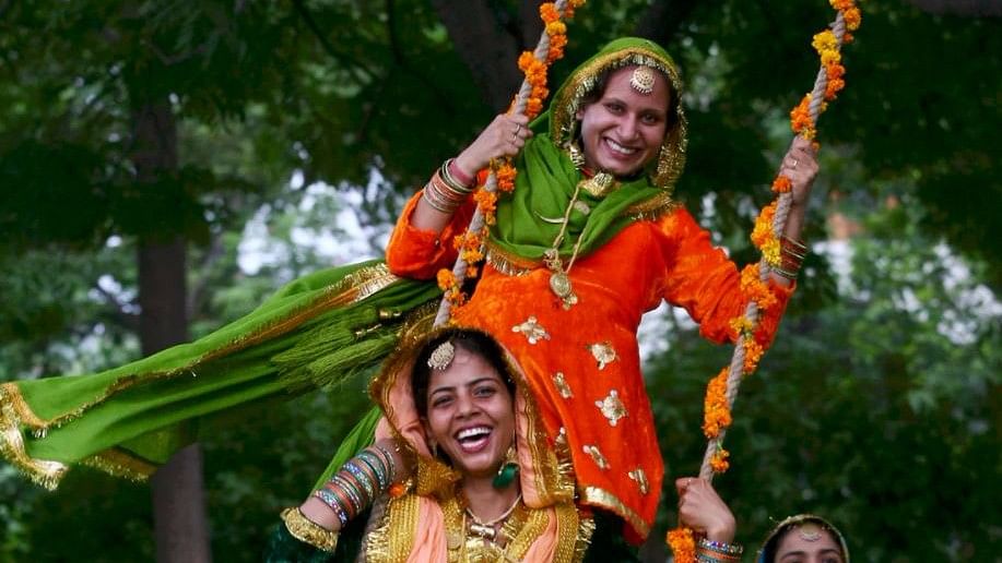  Women celebrate the ‘Teej’ festival.