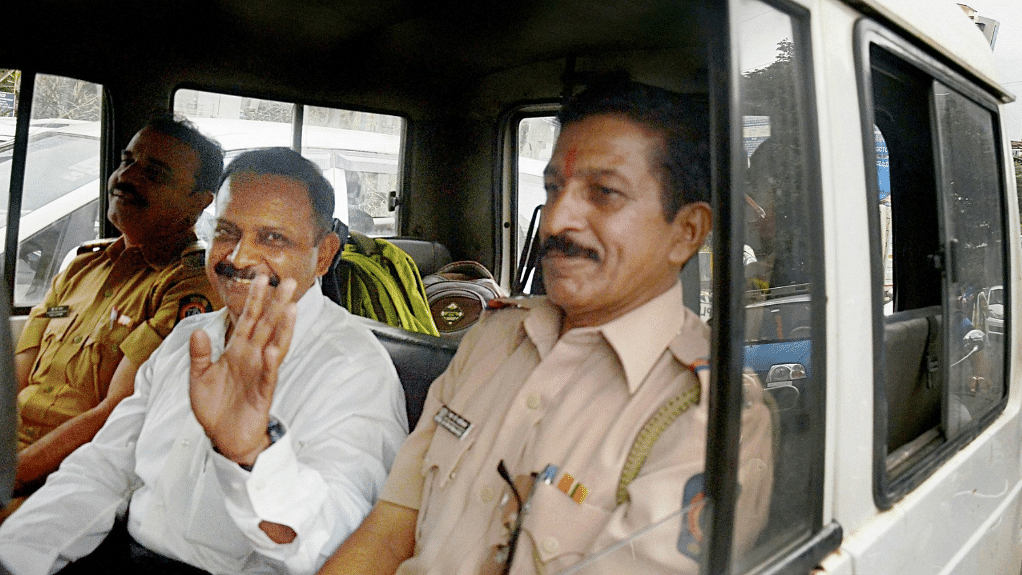 Lt Col Shrikant Prasad Purohit being escorted from jail.