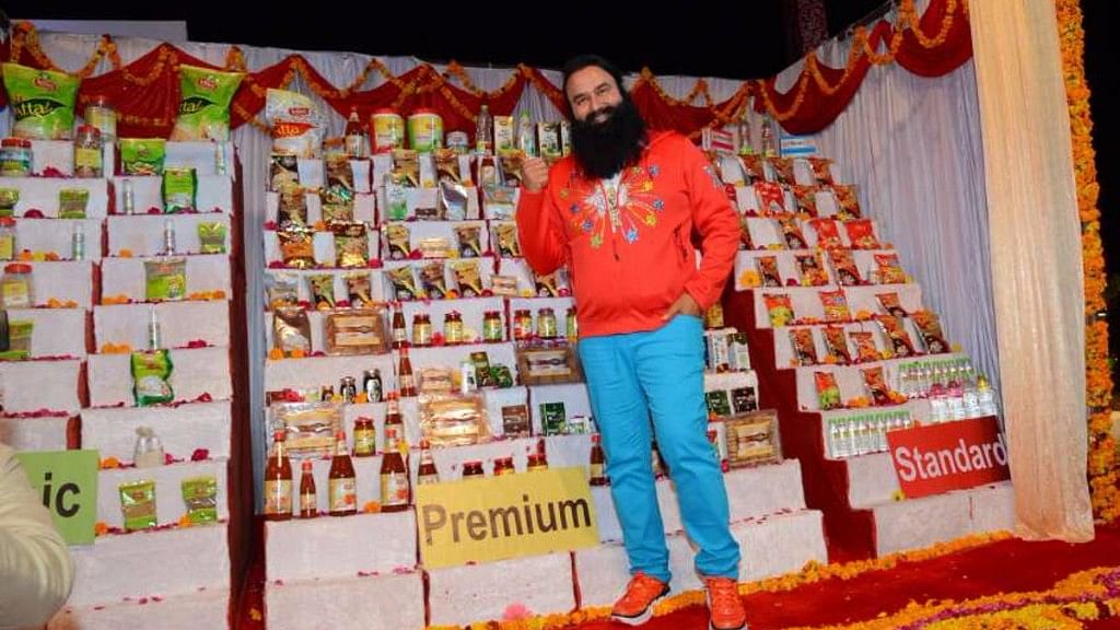 DSS chief Ram Rahim posing with his company’s products.&nbsp;