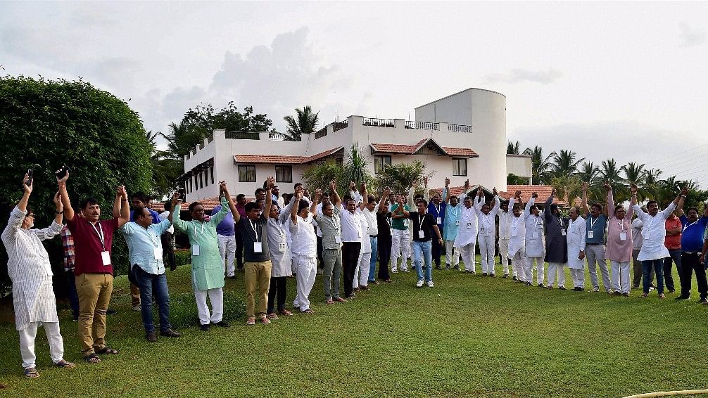 

Gujarat Congress MLA show their unity at a press conference at a resort on the outskirts of Bengaluru.
