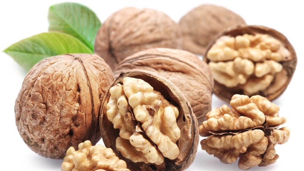 Consumption of walnuts may help suppress growth and survival of breast cancer, a study claims. 