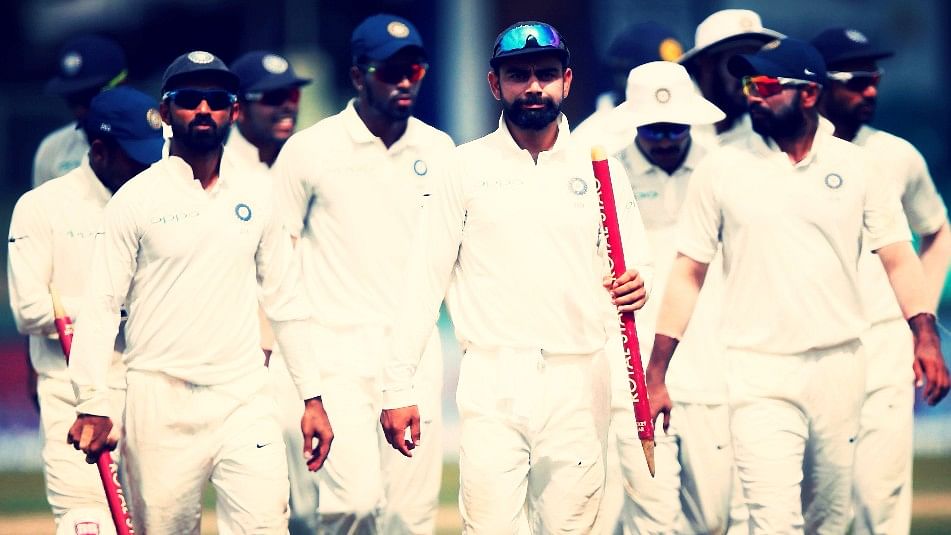 Virat Kohli and his team walk off the ground after they beat Sri Lanka by an innings and 53 runs in the second Test in Colombo.&nbsp;