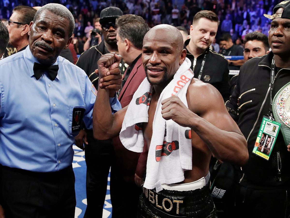 Mayweather ended his career with a 50-0 record. 