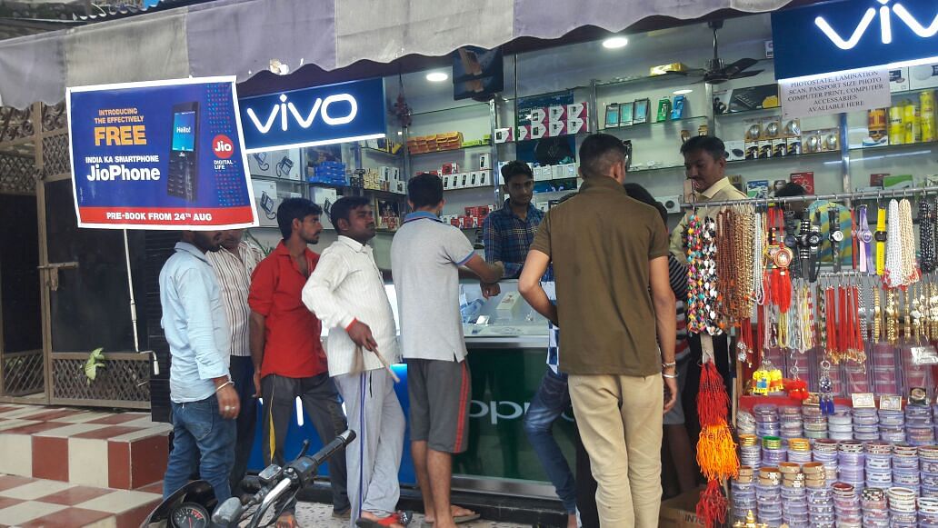 People coming to see the JioPhone at a retail store in Delhi.