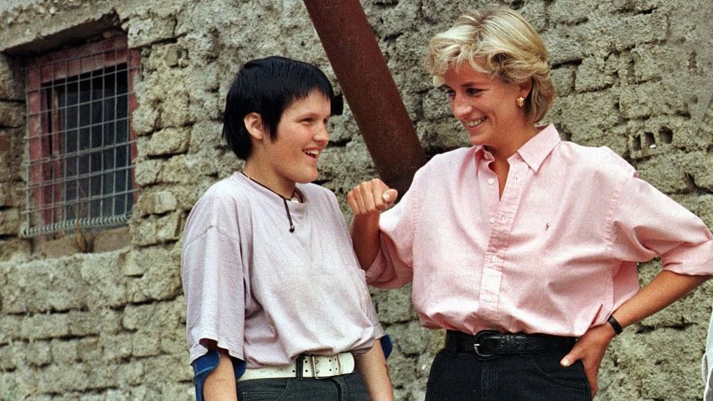 

In this file photo dated 10 August  1997, Princess Diana chats with 15-year old landmine victim Mirzeta Gabelic in Sarajevo.