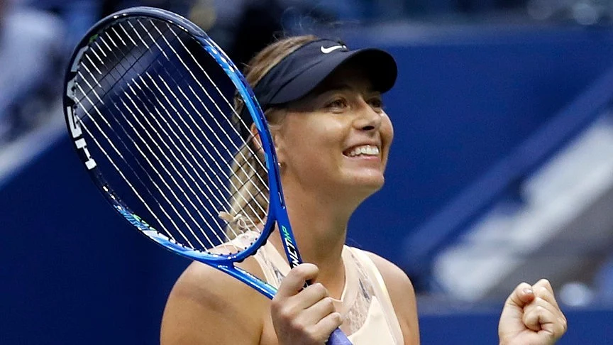 Maria Sharapova, of Russia, reacts after beating Timea Babos, of Hungary, during the second round of the US Open tennis tournament.