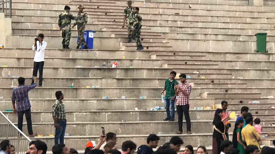 Non-biodegradable waste left behind by tourists at Wagah Border as they are busy clicking selfies. BSF soldiers can be seen collecting waste in the bins they walk around with.