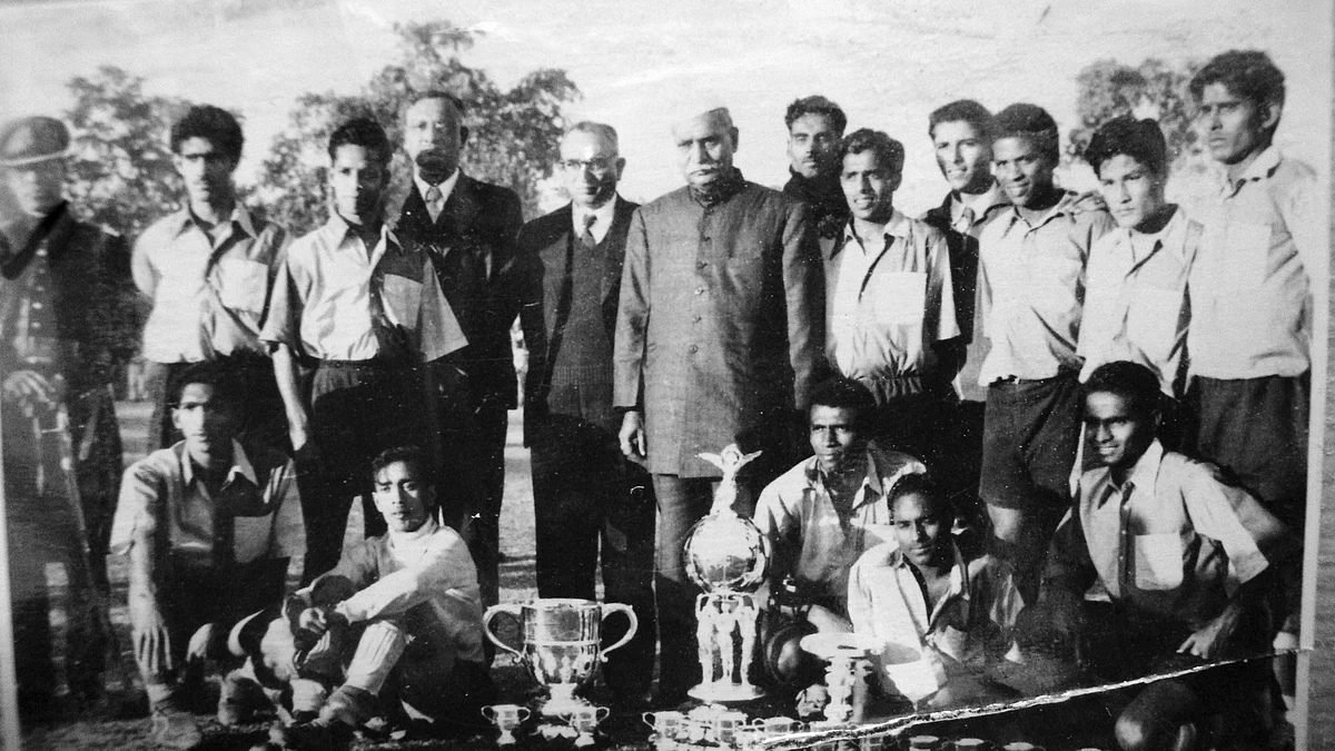 The East Bengal team,winners of the 1956 Durand,with President Dr Rajendra Prasad, a football enthusiast. Standing from left are T.A. Rahman and J. Kittu; sitting from right is M. Kempaiah and next tohim is Kannayan. 
