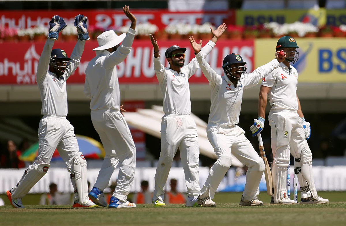 The Indian players appeal for a wicket during a Test match against Australia.