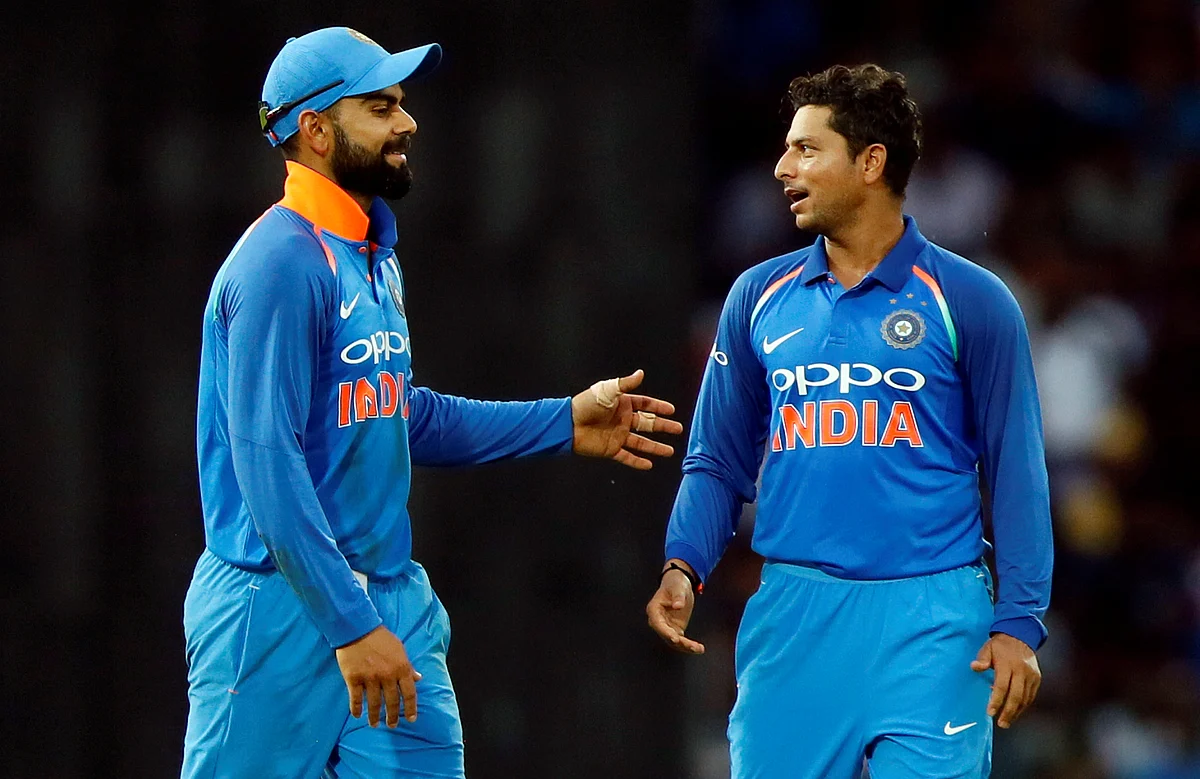 Kuldeep Yadav shares a moment with Virat Kohli during an ODI.