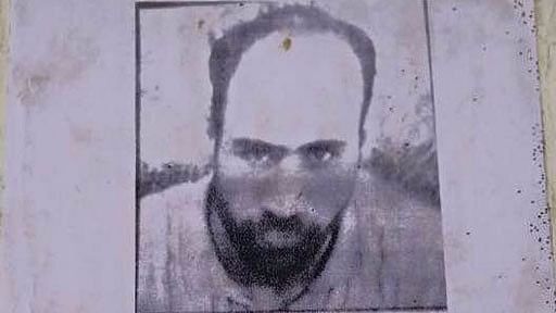 A bounty poster released by J&amp;K Police announcing a reward of Rs 10 lakh on Abdul Qayoom Najar.   (Photo: Jehangir Ali) 