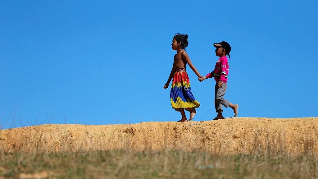 Rohingya children are seen as they walk near the Kutupalang Refugee Camp in Cox’s Bazaar in Bangladesh. Image used for representational purposes.