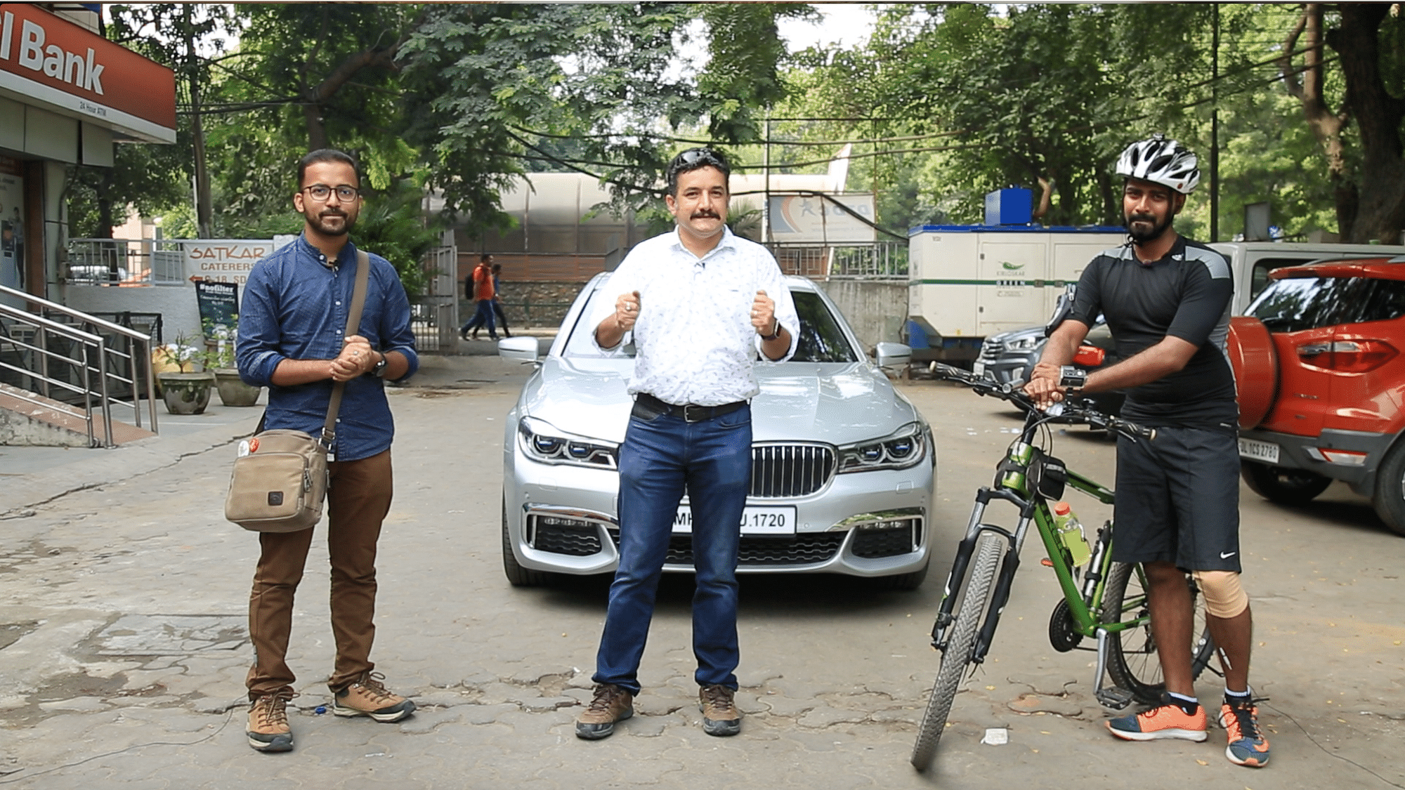 A cycle challenges a BMW 7-Series and the Delhi Metro Rail to a race.