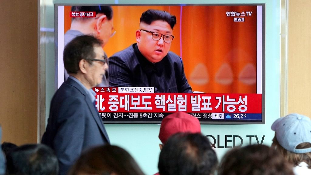 

People watch a TV news programme showing North Korean leader Kim Jong Un at the Seoul Railway Station in Seoul on Sunday. 