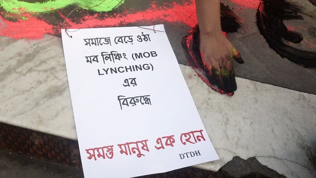 A poster during a demonstration against mob lynchings in Kolkata on 6 July 2017. The poster reads: ‘Against increasing mob lynchings, Let us all stand together.’