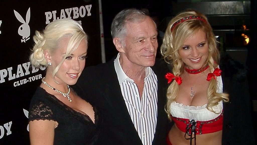 Hugh Heffner with his bevy of blondes.