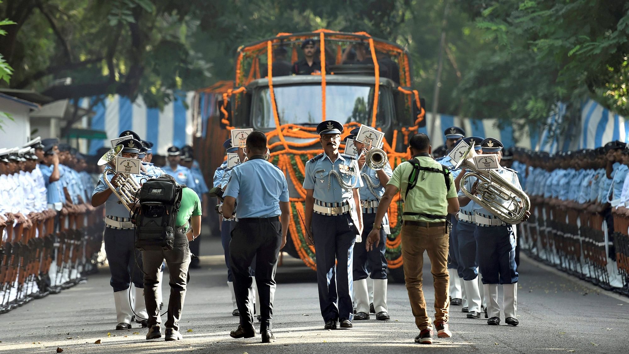 Defence personnel accompany the procession for the state funeral of Marshal of the Indian Air Force Arjan Singh