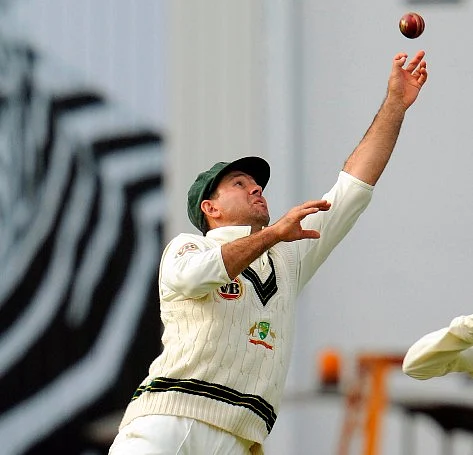 Ricky Ponting goes for a catch during a Test match.