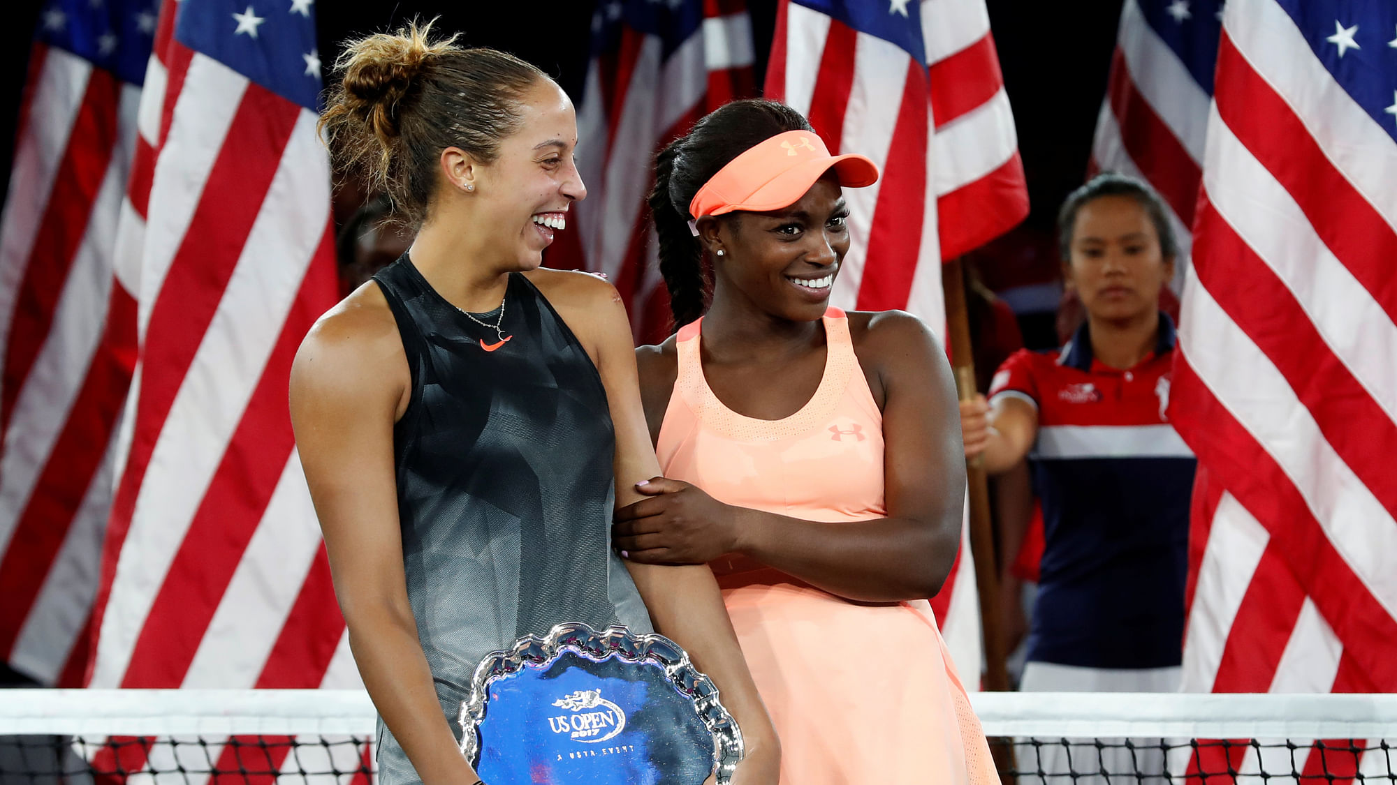 Champion Sloane Stephens of the United States with Madison Keys of the United States during the awards ceremony.&nbsp;