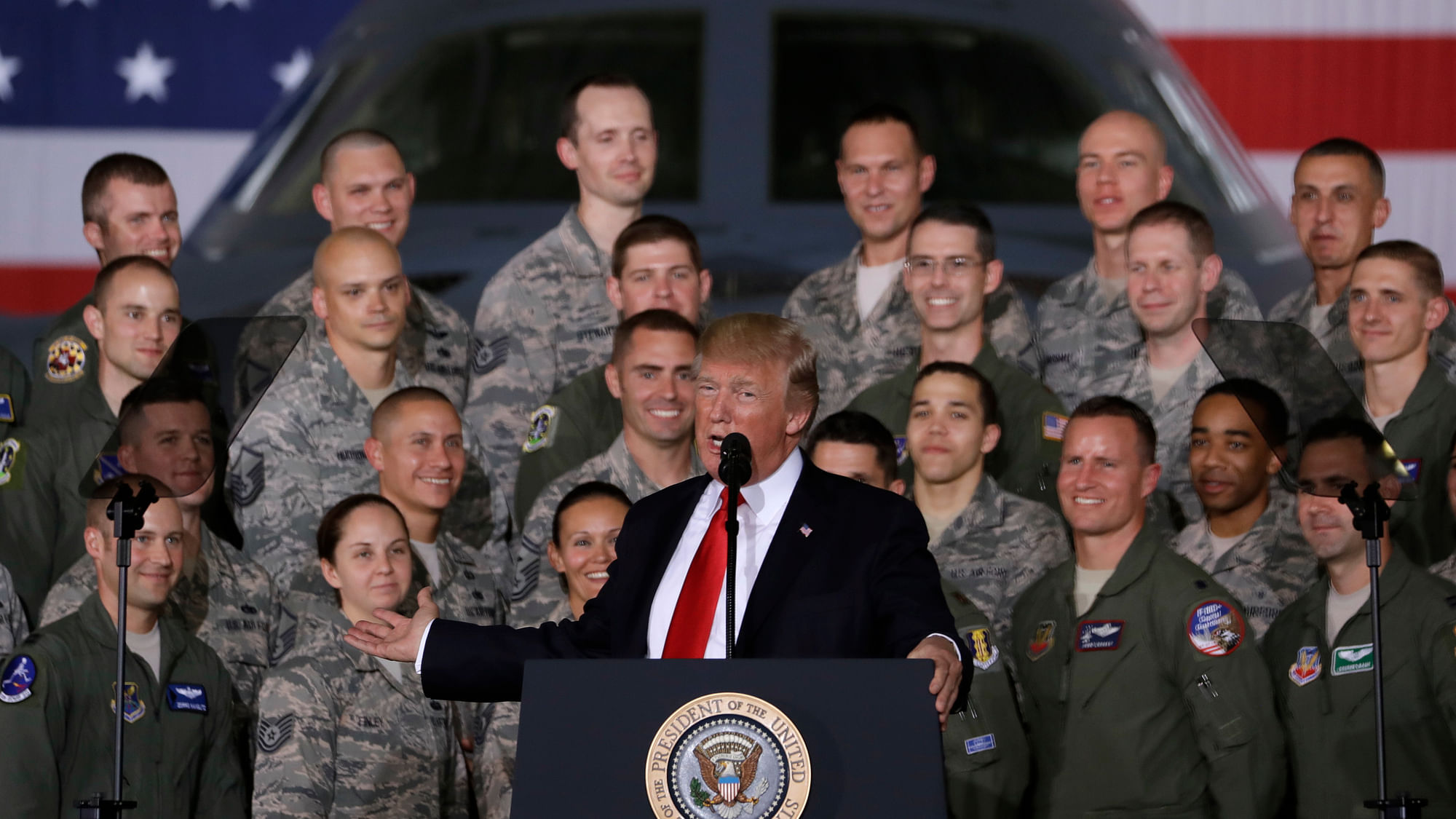 US President Donald Trump speaks to military personnel and their families at Andrews Air Force Base.