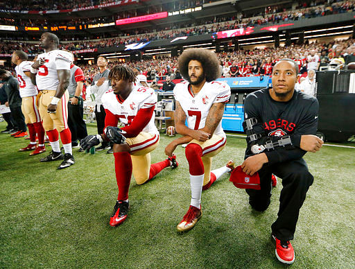 

Players are protesting the US administration’s perceived racism by kneeling during the pre-game national anthem.