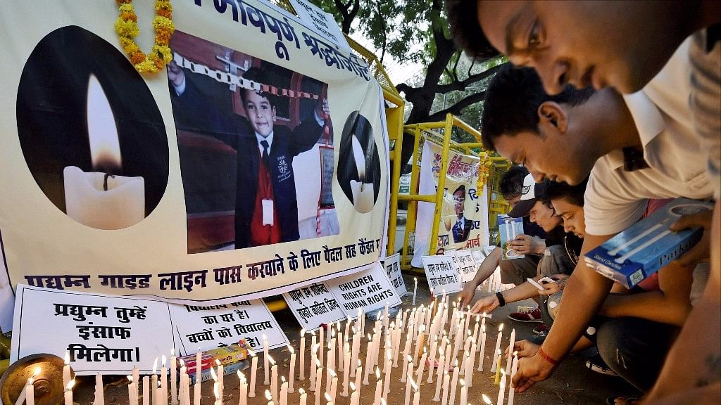 Students take out a candle march to pay tributes and demand justice for seven-year-old Pradyumn Thakur.