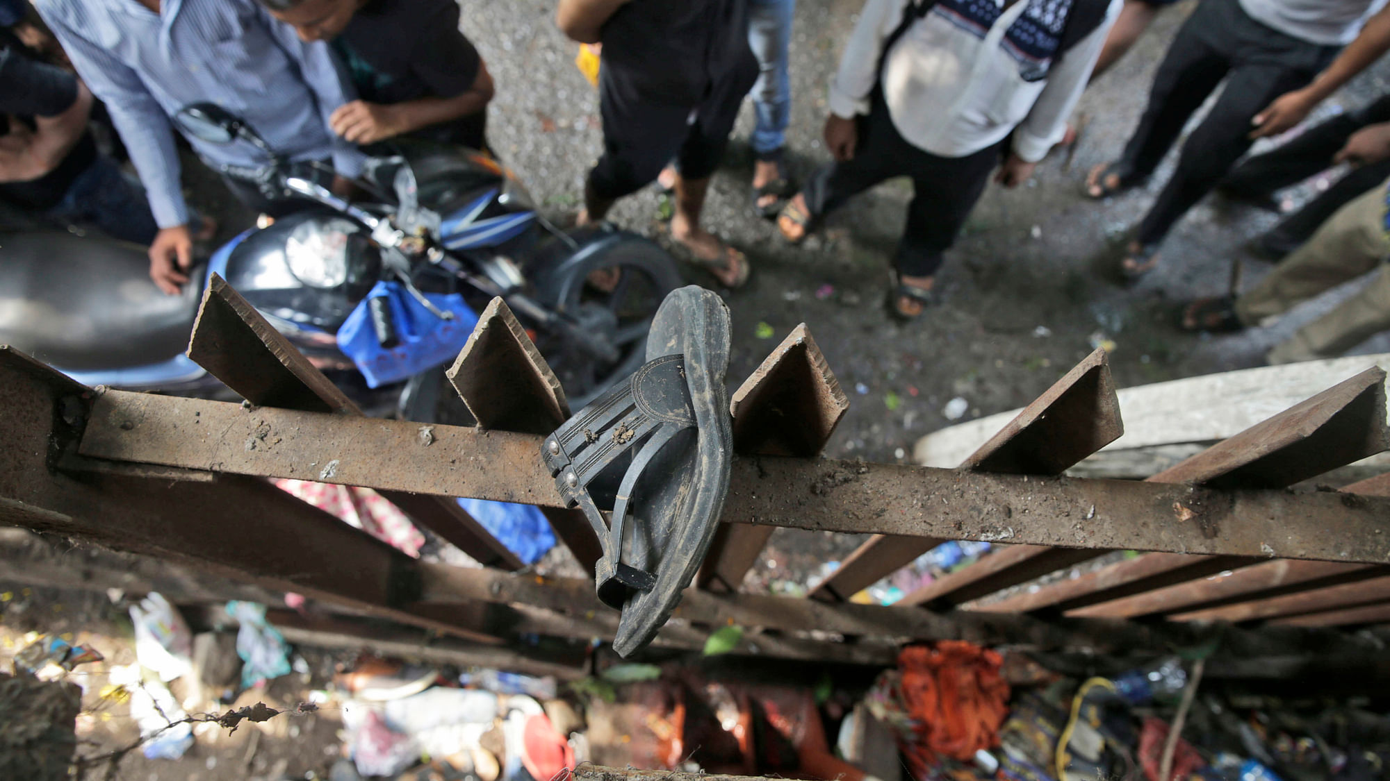 File image of a a victim’s sandal stuck on the fence of the Elphinstone Road station.