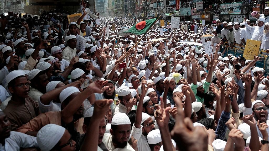 Supporters of the hardline Hefazat-e-Islam shout slogans after police prevented them from marching towards Myanmar Embassy to protest against the persecution of Rohingya Muslims, in Dhaka, on Monday.