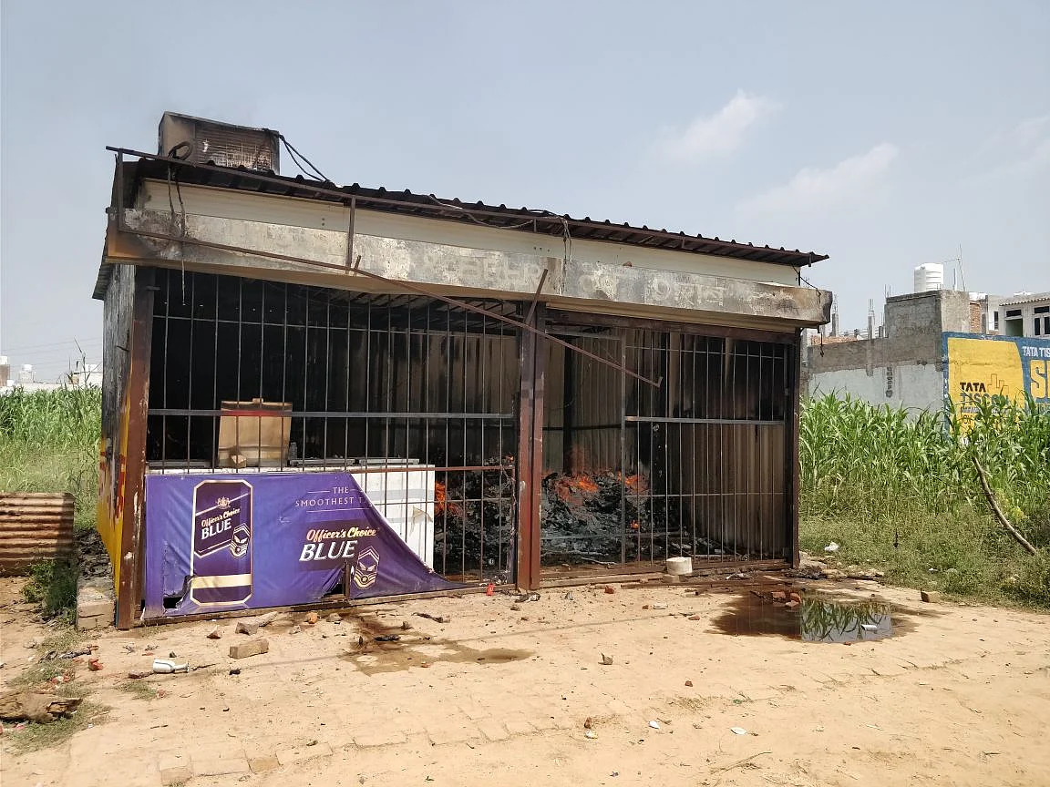 Angry parents burnt a liquor store down.