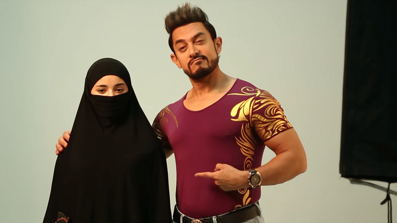 Aamir Khan and Zaira Wasim in a scene from <i>Secret Superstar. </i>